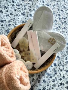 a basket filled with items in a blanket at Wind Residences Tower 2 Tagaytay in Tagaytay +16 photos