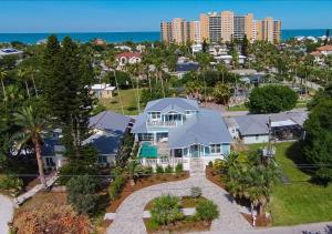 an aerial view of a house with palm trees at Dream Vacation Beach House in Clearwater Beach