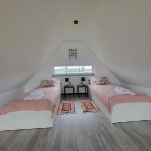 Ένα ή περισσότερα κρεβάτια σε δωμάτιο στο Baltic Barns Berg