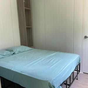 Postel nebo postele na pokoji v ubytování Apartamento Estilo Container