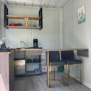 Kuchyň nebo kuchyňský kout v ubytování Apartamento Estilo Container