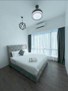 Postel nebo postele na pokoji v ubytování SDC Suite Home