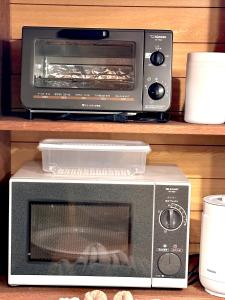 Cucina o angolo cottura di 東京-7度 BBQ可 温泉付友達や家族と一棟貸b