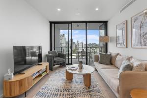 Χώρος καθιστικού στο Immaculate Burleigh Apartment at Sandbar Burleigh Heads