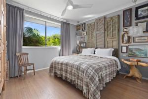 Ένα ή περισσότερα κρεβάτια σε δωμάτιο στο Culburra Beach House