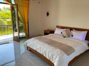 Dira Bungalows客房内的一张或多张床位