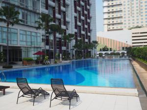 ジャカルタにあるLuxury 2BR Summit Apt with Pool, Gym, WiFiのギャラリーの写真