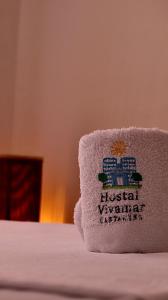 Postel nebo postele na pokoji v ubytování Hostal Viva Mar