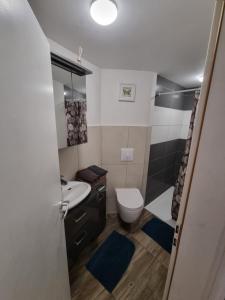 Koupelna v ubytování Schöne Wohnung im Zentrum von Ahnatal