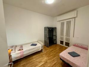 Postel nebo postele na pokoji v ubytování La Casa di Raffi