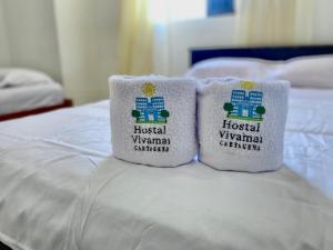 Postel nebo postele na pokoji v ubytování Hostal Viva Mar
