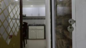 Kuchyň nebo kuchyňský kout v ubytování Hostal Viva Mar