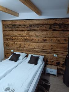 Un pat sau paturi într-o cameră la Casa Valentina