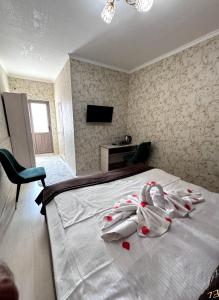 TV a/nebo společenská místnost v ubytování UMAR Hotel + 94 fotografií