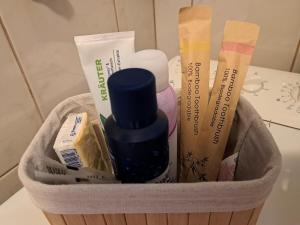 a basket filled with cosmetics and other items on a table at LuMiDo in Osijek +25 photos