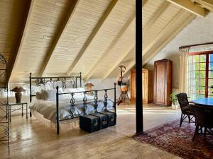 a bedroom with a bed in a room at Kloofzicht Estate Country House in Tulbagh