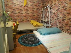 Postel nebo postele na pokoji v ubytování Ở Mô Dalat