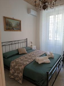 Letto o letti in una camera di Testaccio Charme Apt