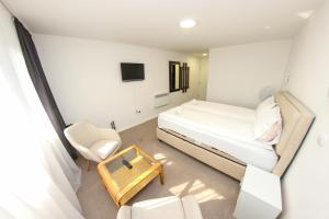 TV i/ili multimedijalni sistem u objektu Guest House LIKE