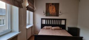 Postel nebo postele na pokoji v ubytování city center apartment