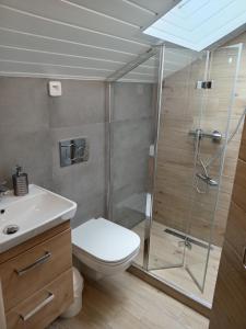 Kúpeľňa v ubytovaní Apartmány Šmika