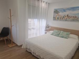Postel nebo postele na pokoji v ubytování Pavone Apartments Málaga
