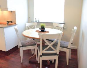 Kuchyň nebo kuchyňský kout v ubytování G18 Apartment