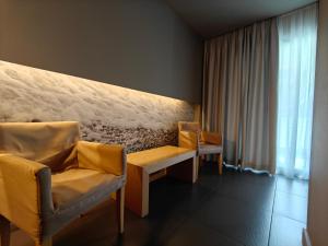 Posezení v ubytování Elysion Hotel