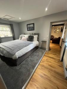 Postel nebo postele na pokoji v ubytování Stepping Stones Cottage