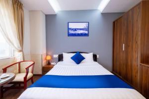 Postel nebo postele na pokoji v ubytování Sandals Hotel