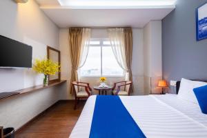 Postel nebo postele na pokoji v ubytování Sandals Hotel