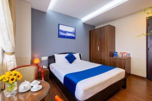 Postel nebo postele na pokoji v ubytování Sandals Hotel