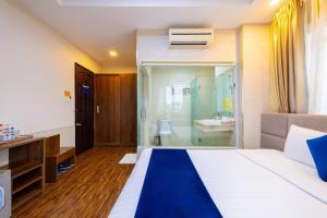 Postel nebo postele na pokoji v ubytování Sandals Hotel