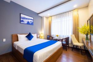 Postel nebo postele na pokoji v ubytování Sandals Hotel