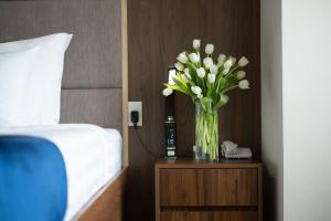 Postel nebo postele na pokoji v ubytování Sandals Hotel