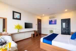 TV a/nebo společenská místnost v ubytování Sandals Hotel