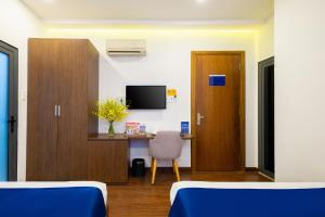 TV a/nebo společenská místnost v ubytování Sandals Hotel