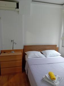Postel nebo postele na pokoji v ubytování Apartman,,Siv,, Prijevor