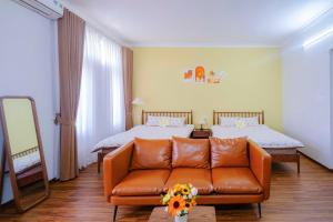 Ein Bett oder Betten in einem Zimmer der Unterkunft Mô Tê Homestay 2 gần Chợ Đông Ba, Cung Đình Hoàng Thành Huế