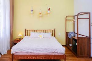 Ein Bett oder Betten in einem Zimmer der Unterkunft Mô Tê Homestay 2 gần Chợ Đông Ba, Cung Đình Hoàng Thành Huế