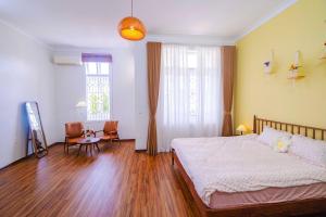 Ein Bett oder Betten in einem Zimmer der Unterkunft Mô Tê Homestay 2 gần Chợ Đông Ba, Cung Đình Hoàng Thành Huế