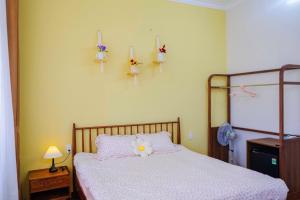 Ein Bett oder Betten in einem Zimmer der Unterkunft Mô Tê Homestay 2 gần Chợ Đông Ba, Cung Đình Hoàng Thành Huế