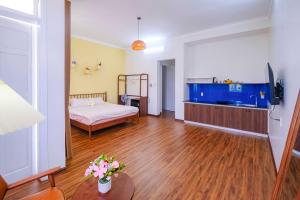 Ein Bett oder Betten in einem Zimmer der Unterkunft Mô Tê Homestay 2 gần Chợ Đông Ba, Cung Đình Hoàng Thành Huế