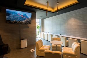 TV a/nebo společenská místnost v ubytování Hotel GRAN THE PARK II