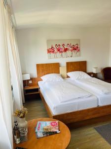 Postel nebo postele na pokoji v ubytování Hotel Hiltruper Hof