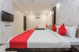 Postel nebo postele na pokoji v ubytování Hotel Galaxy