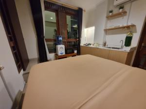 Kuchyň nebo kuchyňský kout v ubytování Rumah Pak Hani, Apartement 2 Kamar Tidur