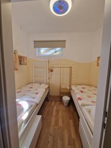Postelja oz. postelje v sobi nastanitve Haus Brenner Weiz