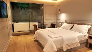 Ένα ή περισσότερα κρεβάτια σε δωμάτιο στο Dream Place Hotel +38 φωτογραφίες