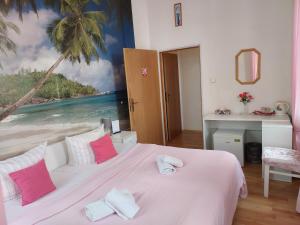 Postel nebo postele na pokoji v ubytování Hotel Asila